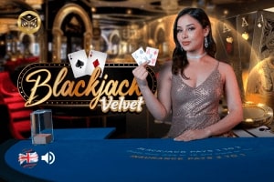 Blackjack Velvet game banner with luxurious velvet textures and casino elements.